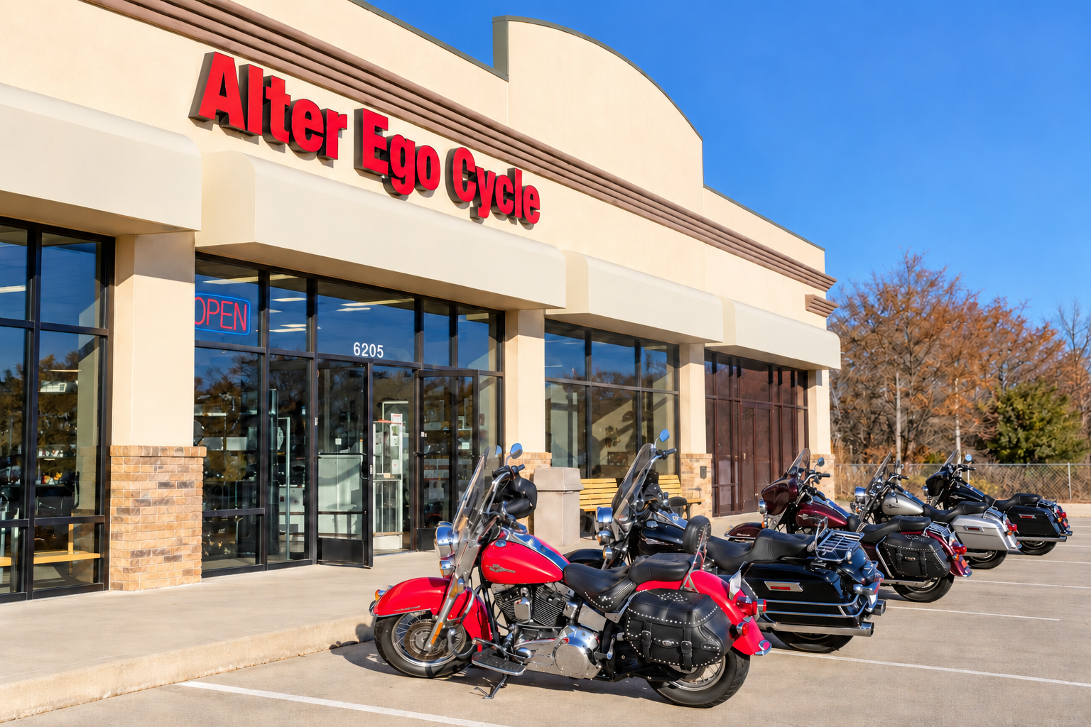 Alter Ego Cycle storefront at 6205 Goddard in Shawnee, Kansas, with motorcycles parked outside.